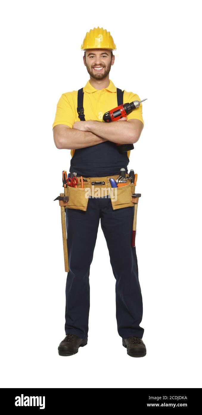 young worker standing with red drill Stock Photo