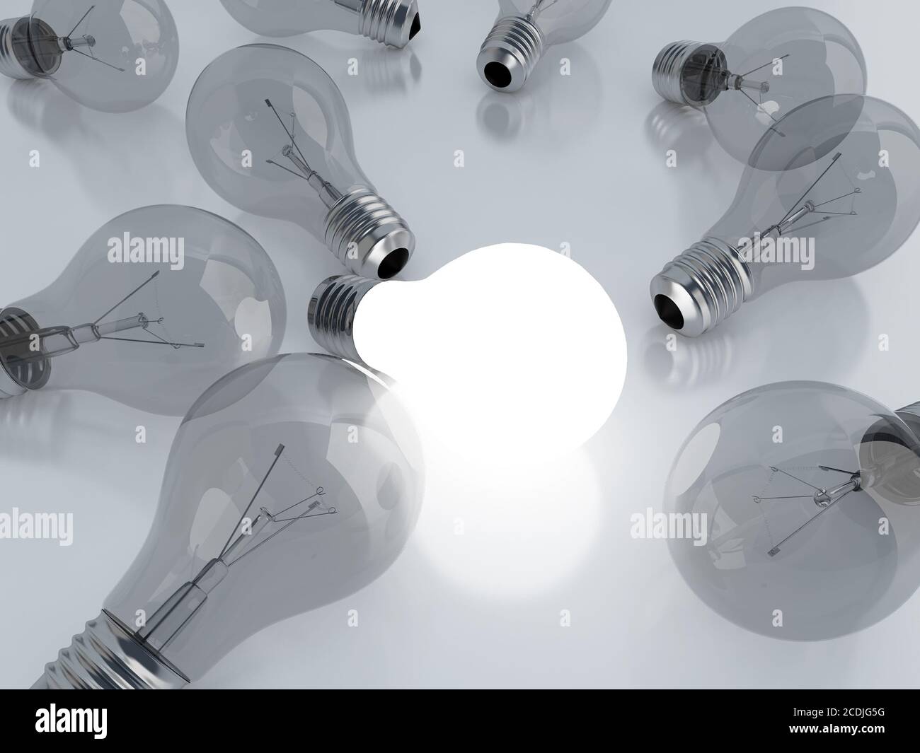 many light bulbs and one is on Stock Photo