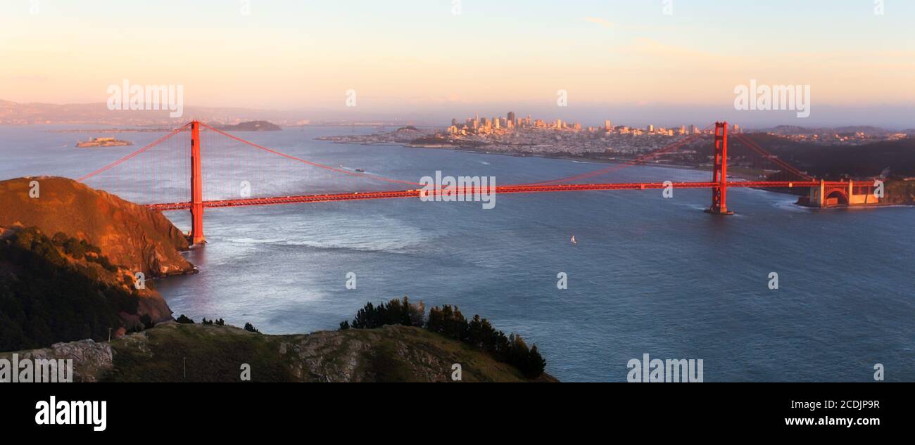 sunset panoramic view of the Golden Gate Bridge from the peak of Hawk Hill Stock Photo