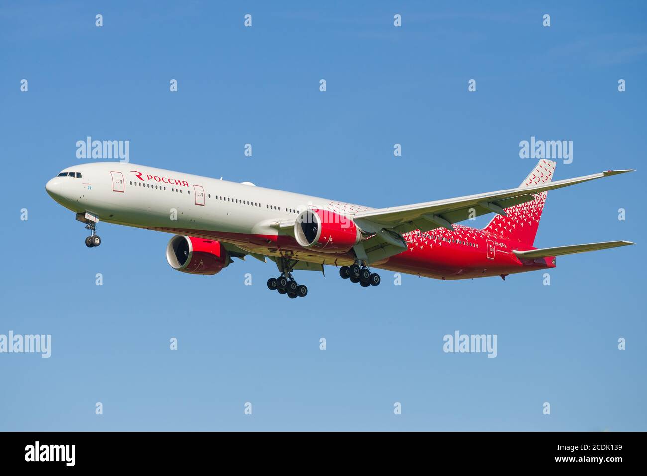 SAINT PETERSBURG, RUSSIA - AUGUST 08, 2020: Airplane Boeing 777-31X (EI-GFA) of Rossiya airlines close-up against blue sky Stock Photo