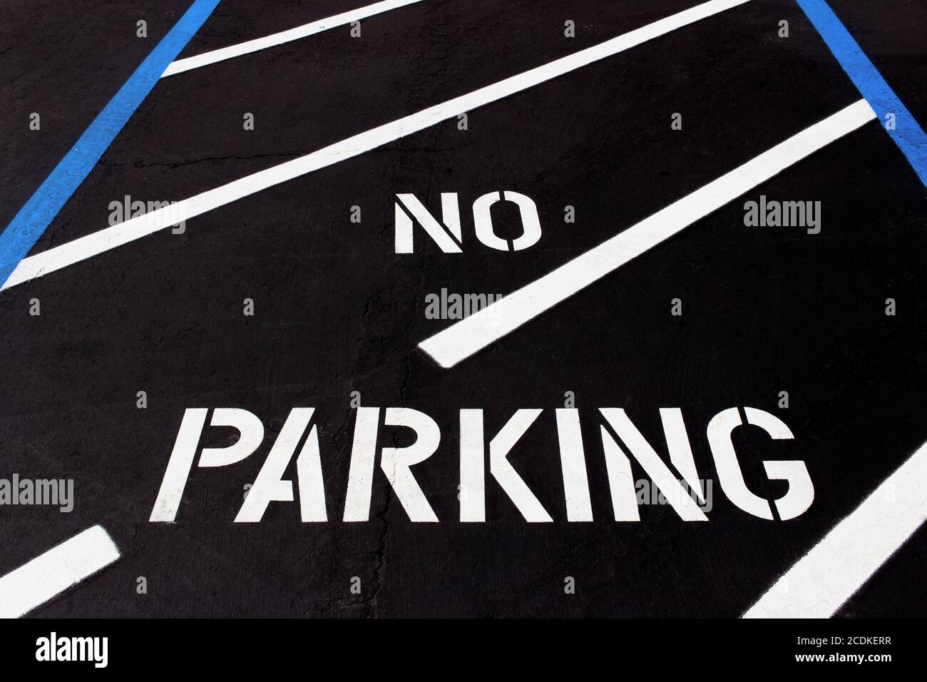 No Parking Painted on Diagonal Parking Lot Stock Photo Alamy