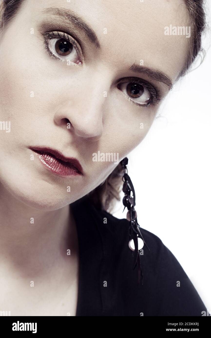 Young serious woman close hi-res stock photography and images - Alamy