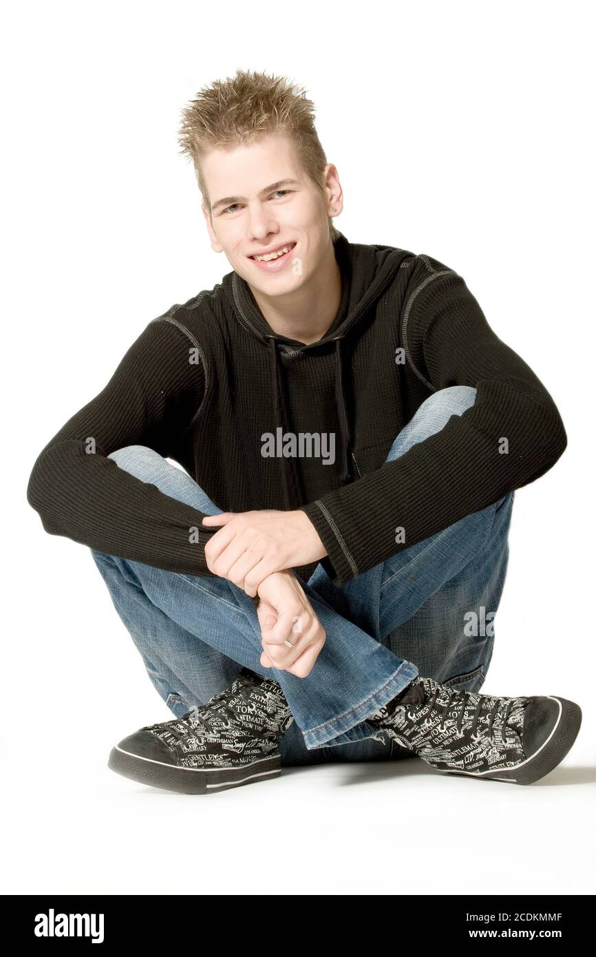 Boy in a black sweater smiling Stock Photo