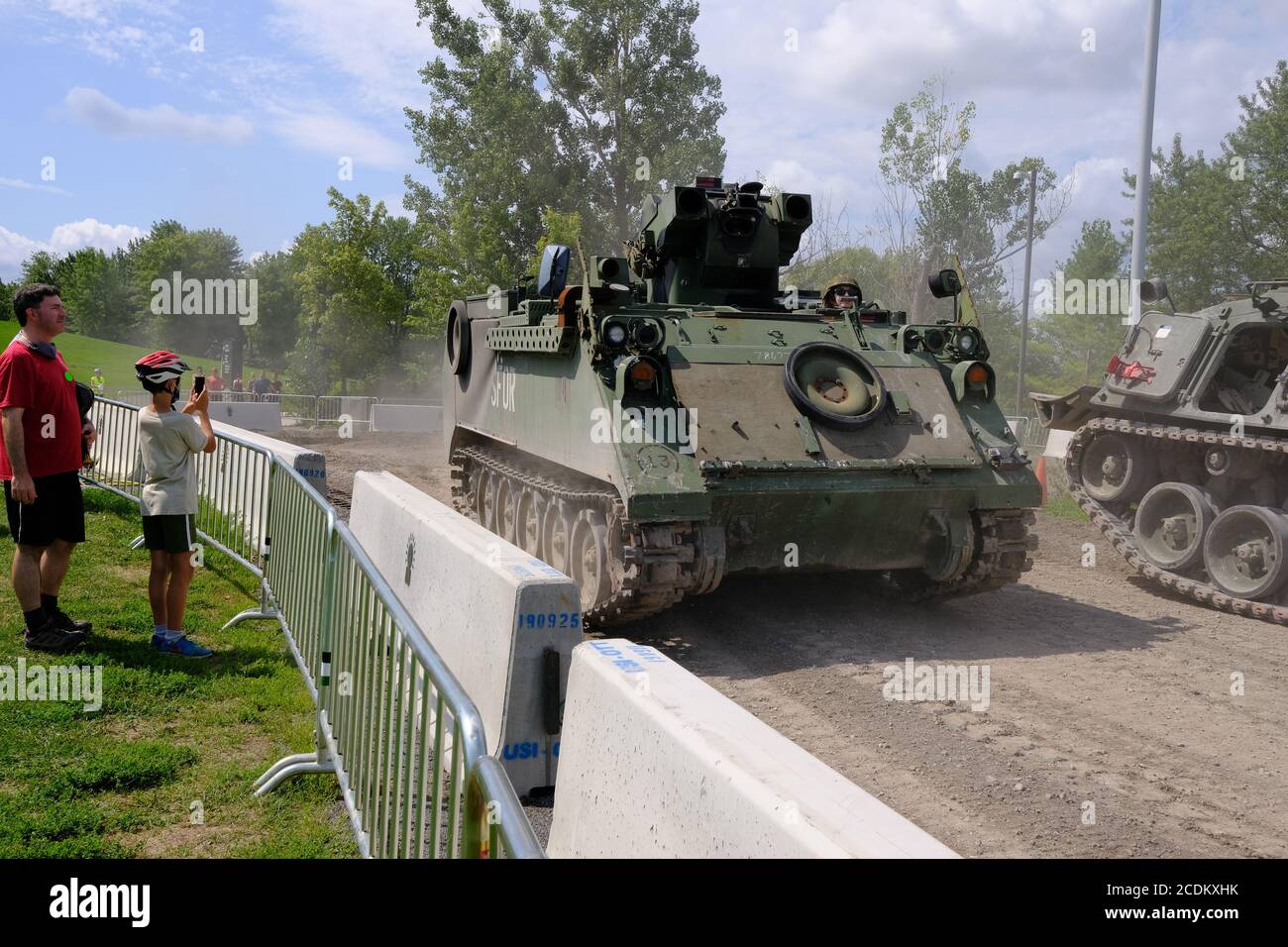 Small (COVID restricted) crowds at the free military vehicle demonstration at the Canadian War Museum, Ottawa, Ontario, Canada. Stock Photo