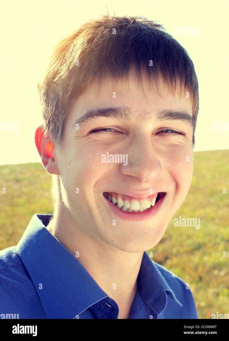 Handsome teenager smile hi-res stock photography and images - Alamy