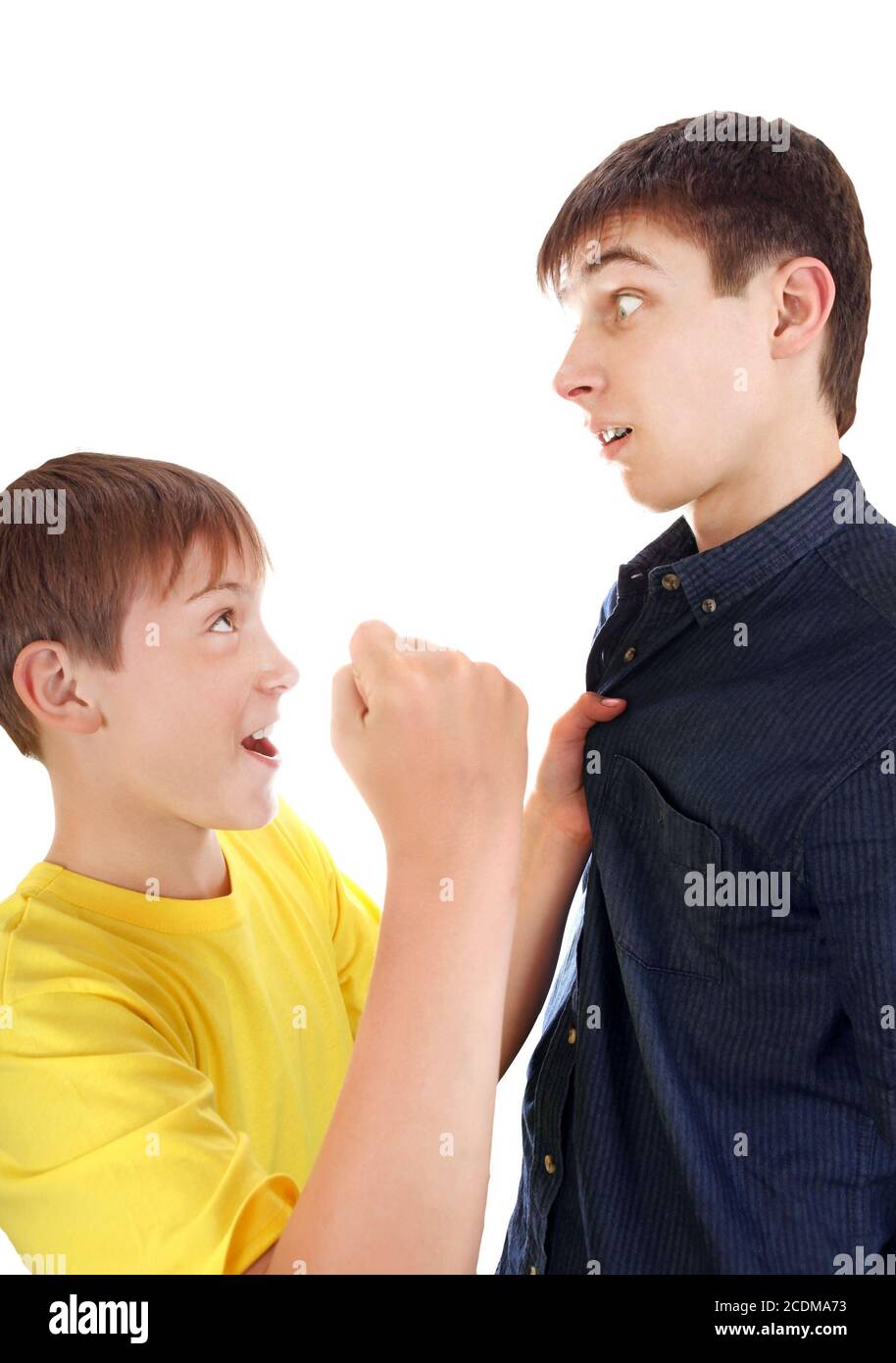 Kid threaten Teenager Stock Photo