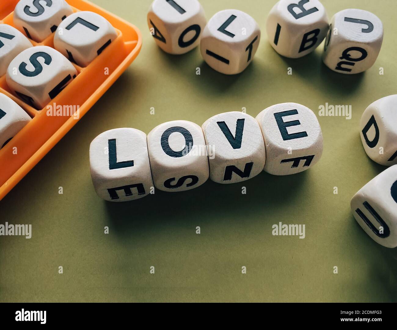 Dice with text love, Word love in the form of dice Stock Photo - Alamy