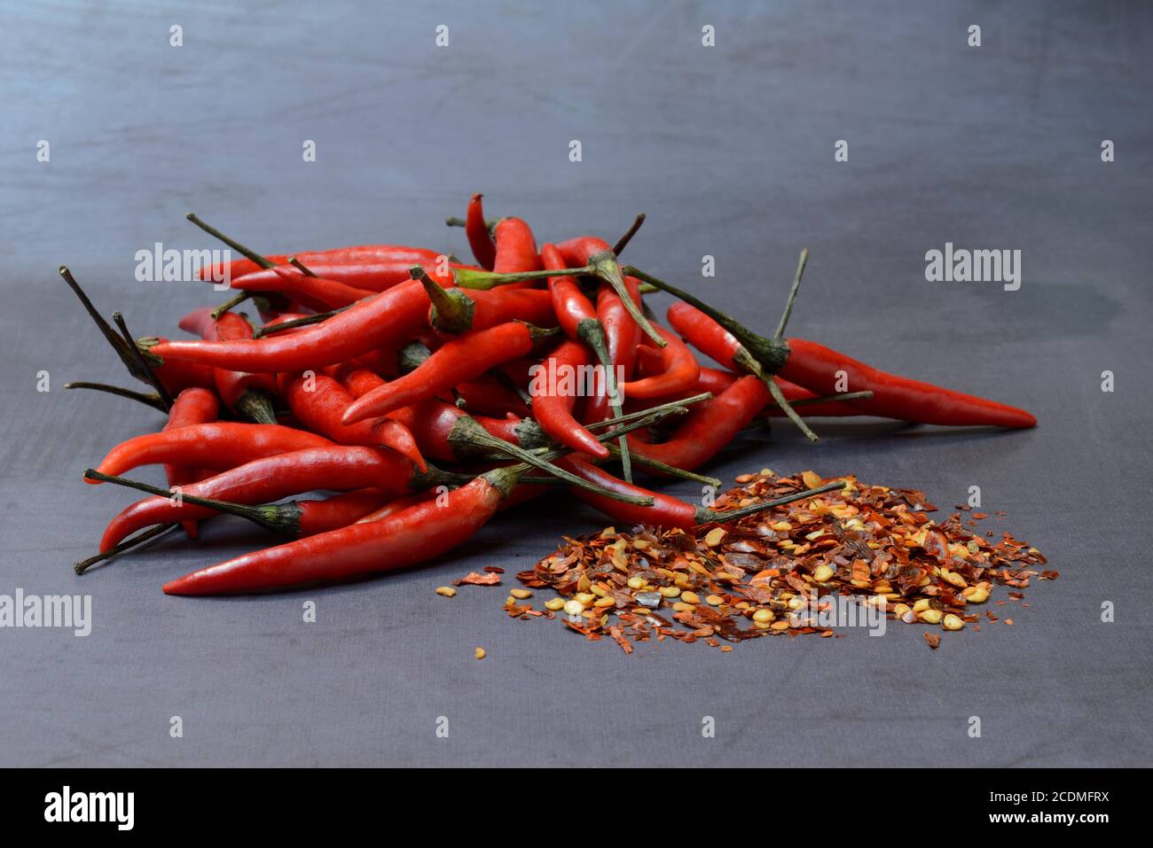 Chilli peppers and chilli flakes, Germany Stock Photo