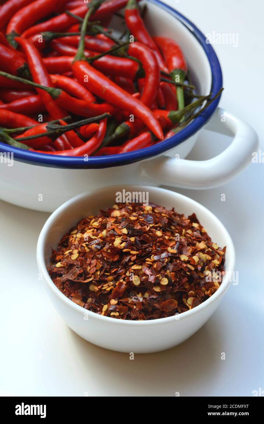Chili flakes in shell and chilli peppers, Germany Stock Photo