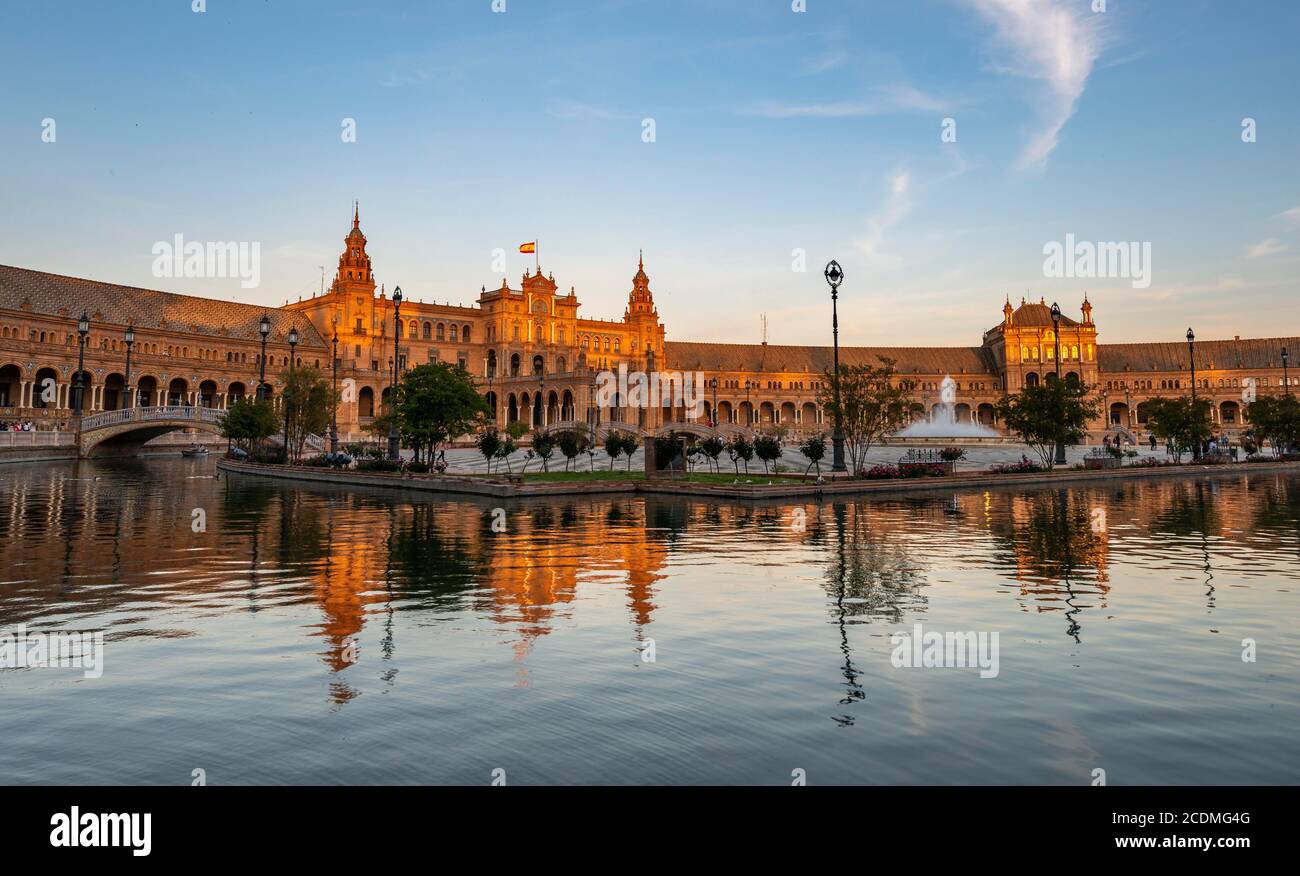 Plaza de Espana in the evening light with reflection in the canal, Sevilla, Andalusia, Spain Stock Photo