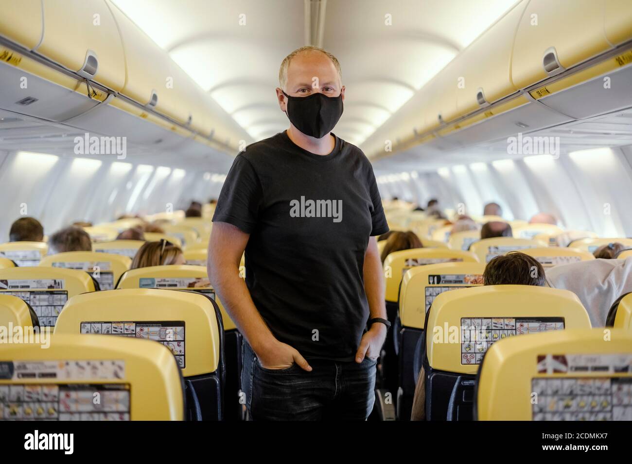 Airplane passenger mask hires stock photography and images Alamy