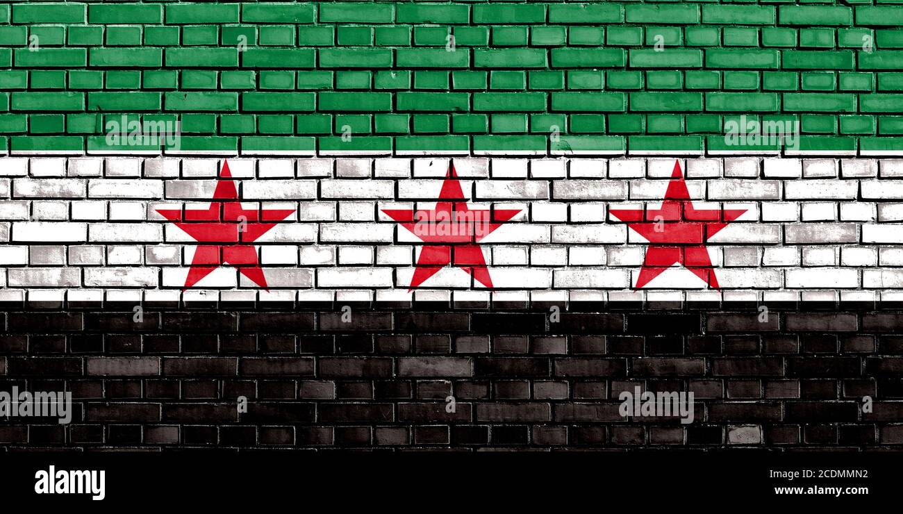 flag of Syrian Republic painted on brick wall Stock Photo