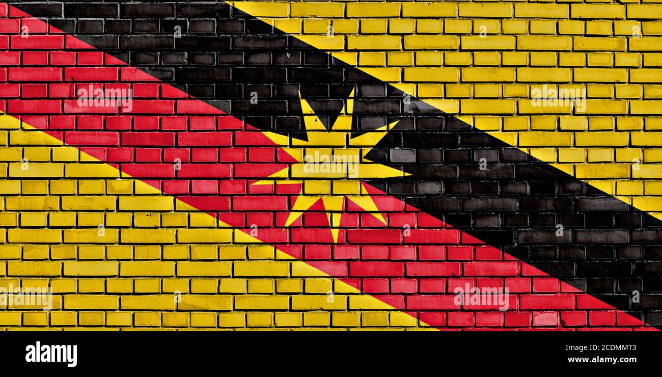 flag of Sarawak painted on brick wall Stock Photo