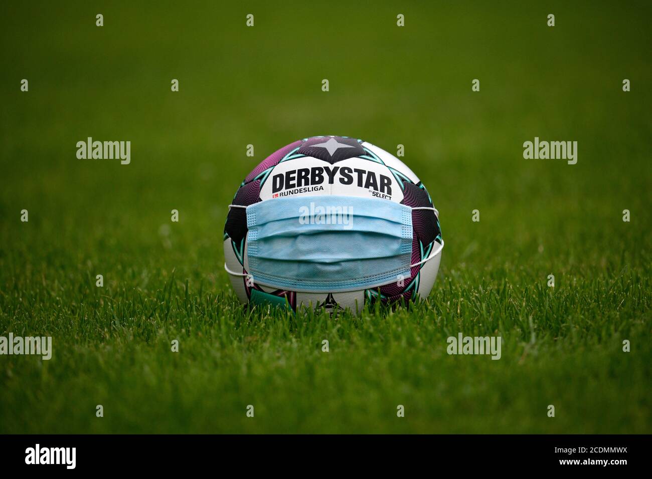 Adidas Derbystar Brillant APS 20/21, match ball of the German Bundesliga  season 2020/2021, face mask, symbolic image of the Bundesliga in the Corona  Stock Photo - Alamy