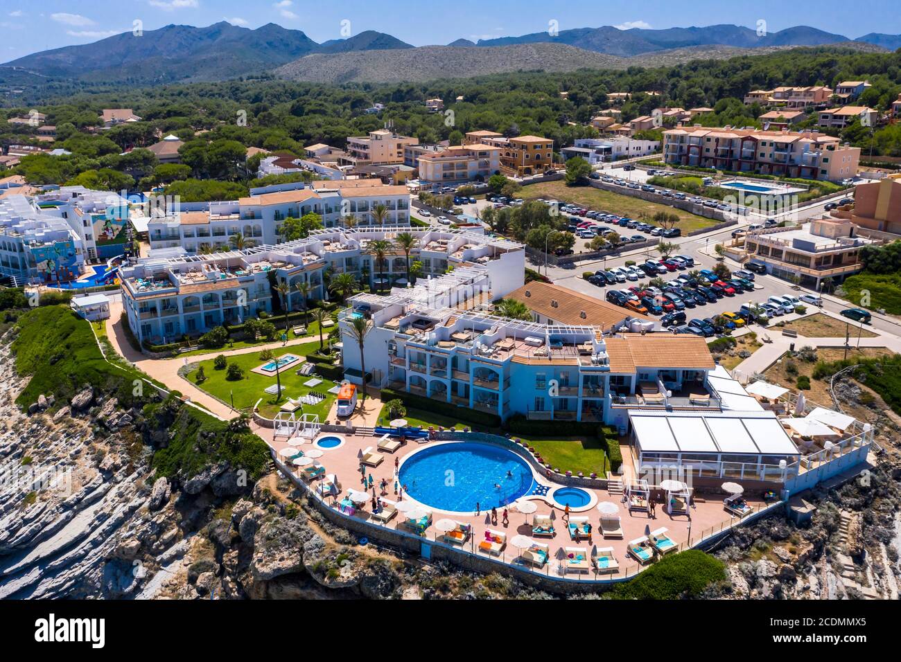 Aerial view, steep coast and beach with Hotel Viva Cala Mesquida Resort &amp; Spa, Cala Agulla, Cala Mesquida, Majorca, Balearic Islands, Spain Stock Photo