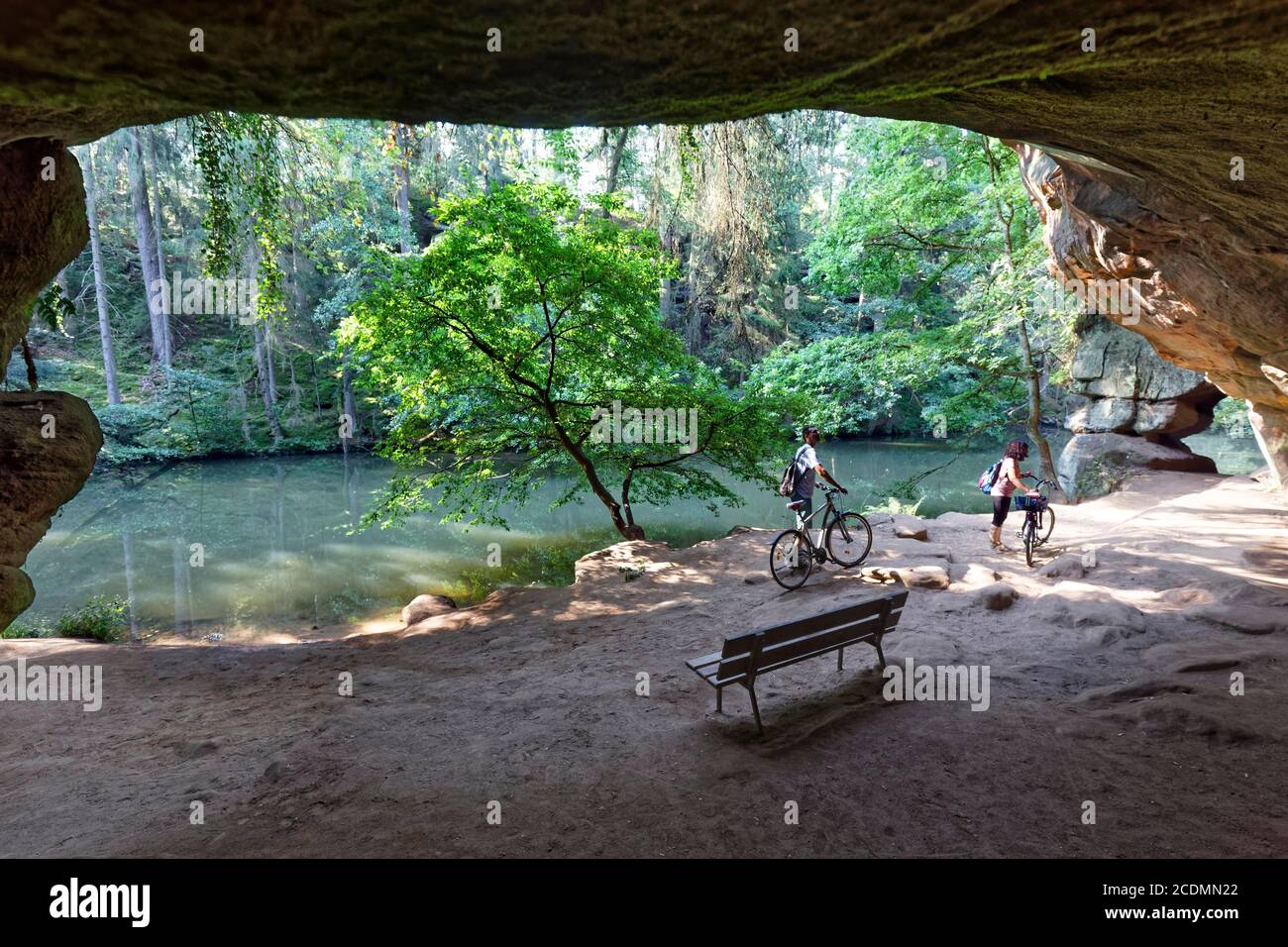 Bank and cyclist in front of gutav adolf cave hires stock photography