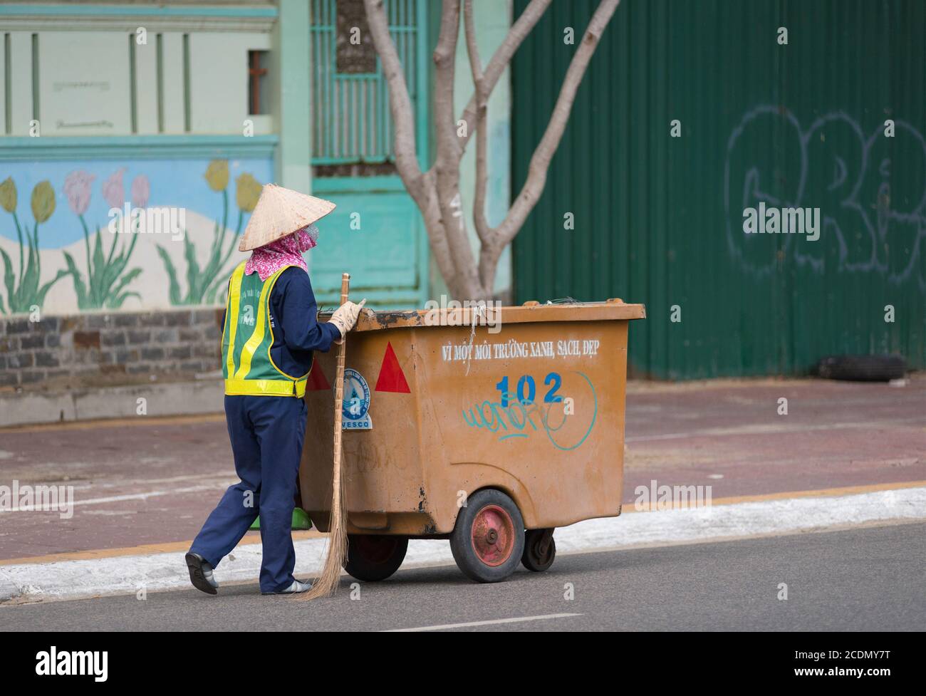 Vietnamese street cleaner Stock Photo