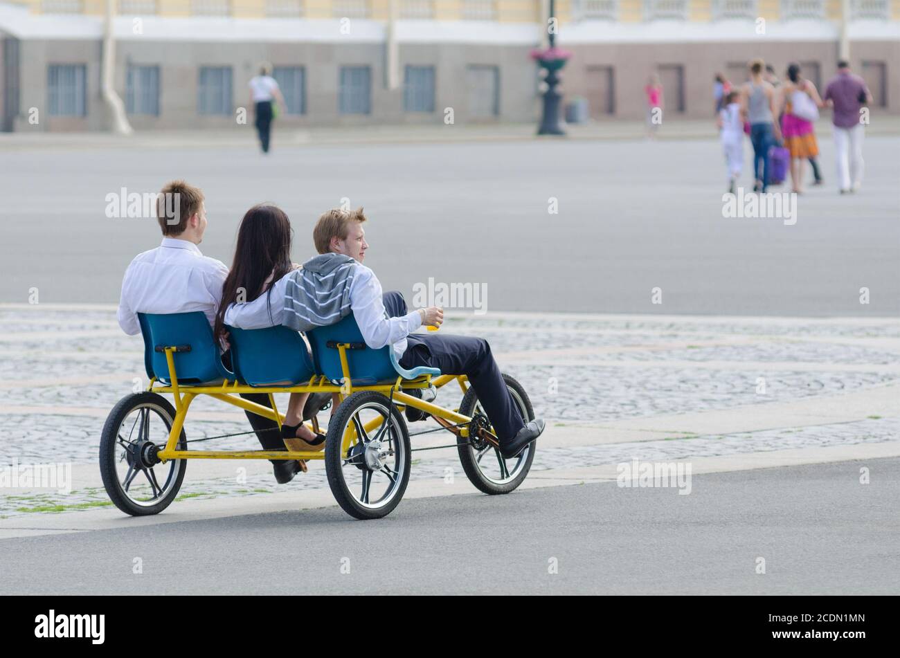 tourists ride tricycle in St. Petersburg Stock Photo