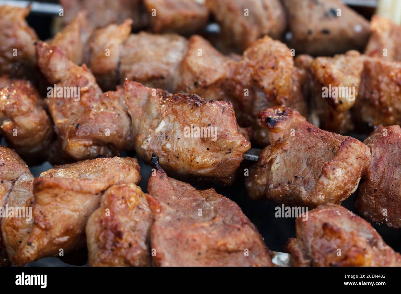 Meat Roted meat roasted on skewers Stock Photo - Alamy