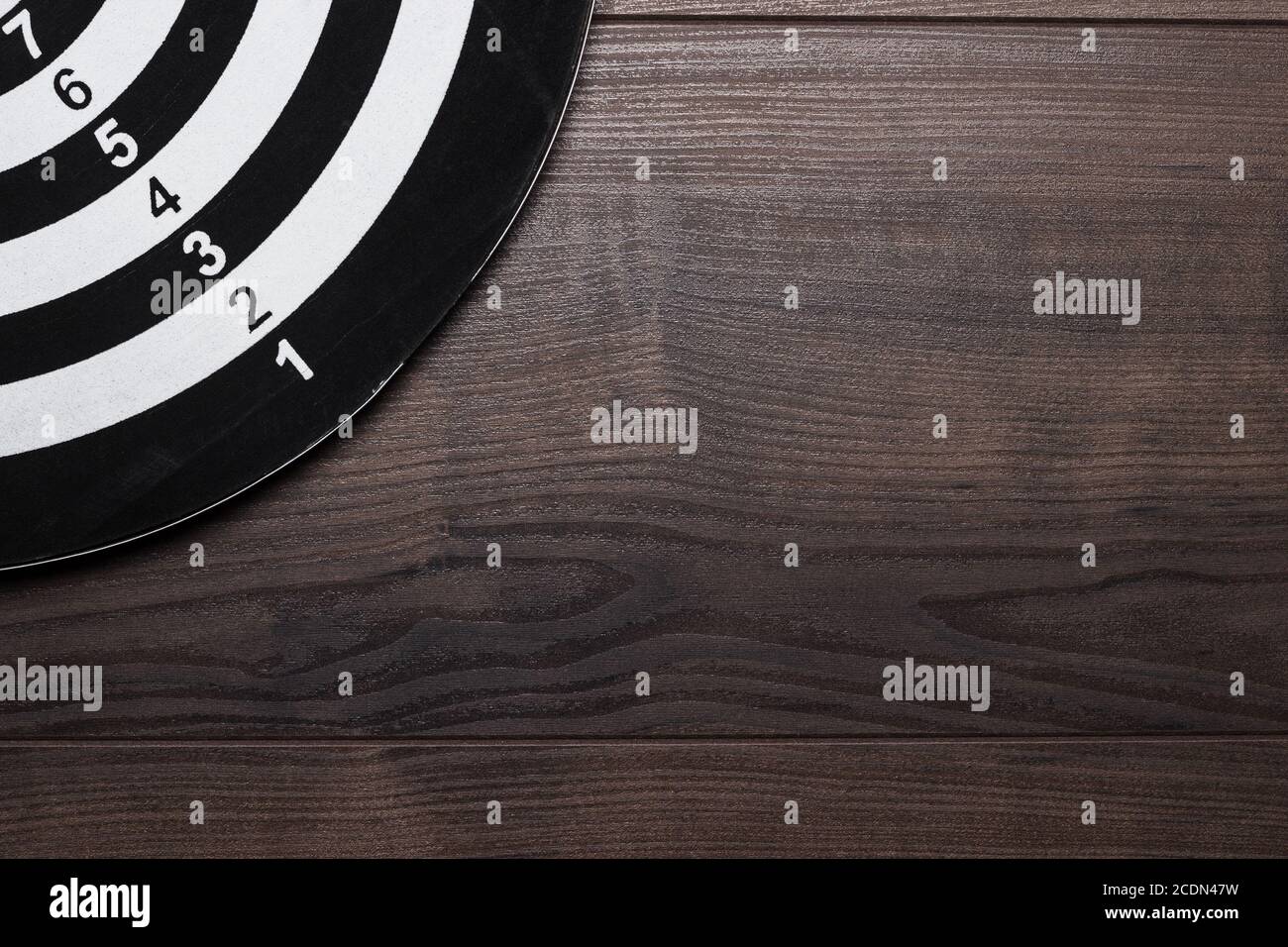 black and white target on wooden background Stock Photo Alamy