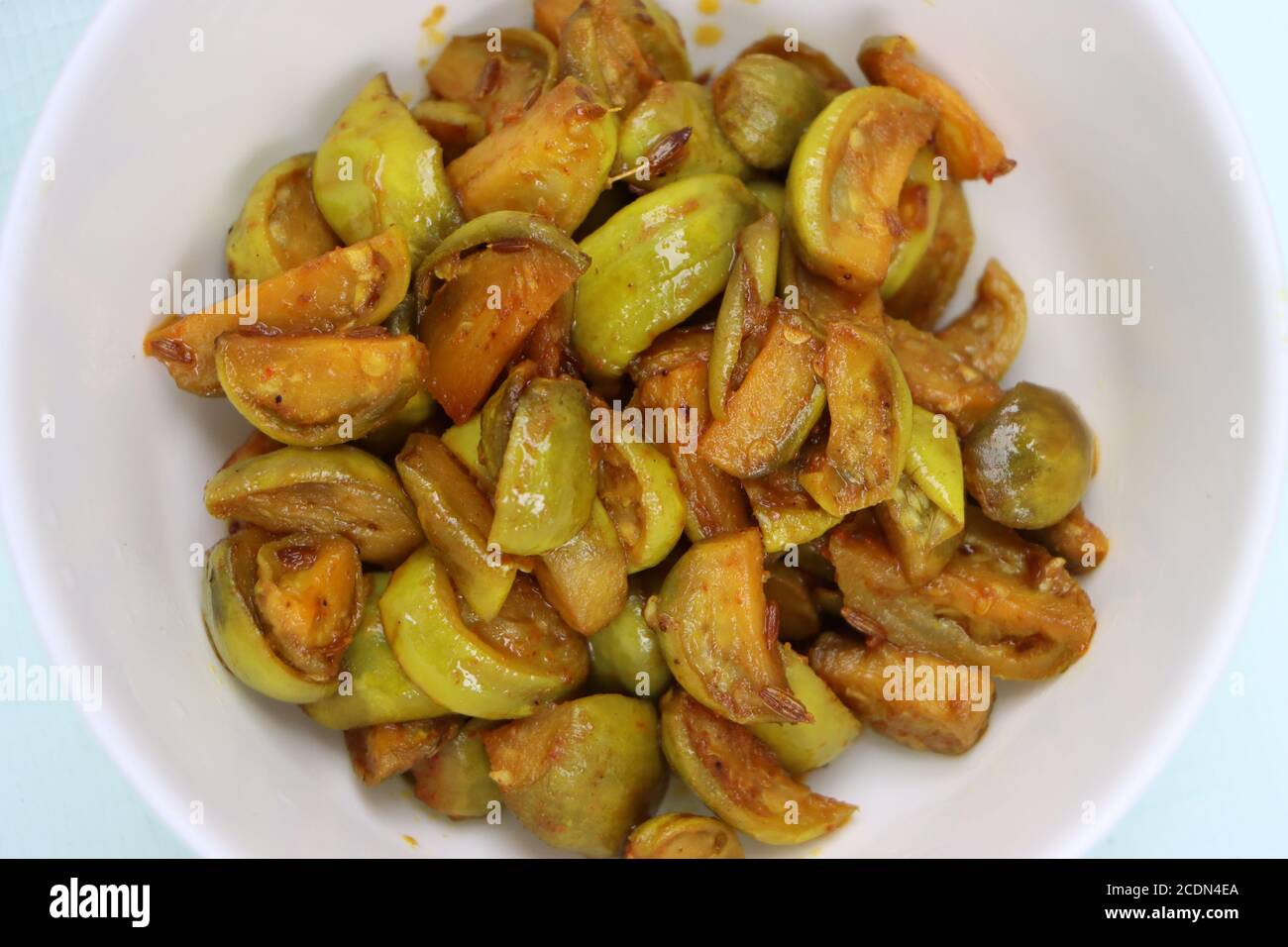 Wild eggplant dry fry, Solanum aethiopicum, traditional local food Stock Photo