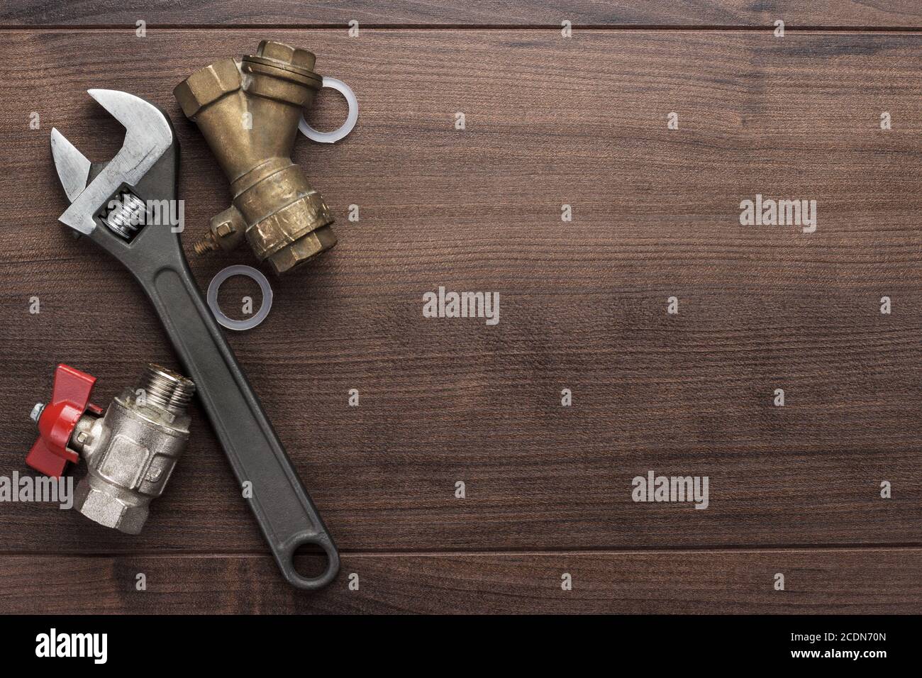 adjustable wrench and pipes Stock Photo - Alamy