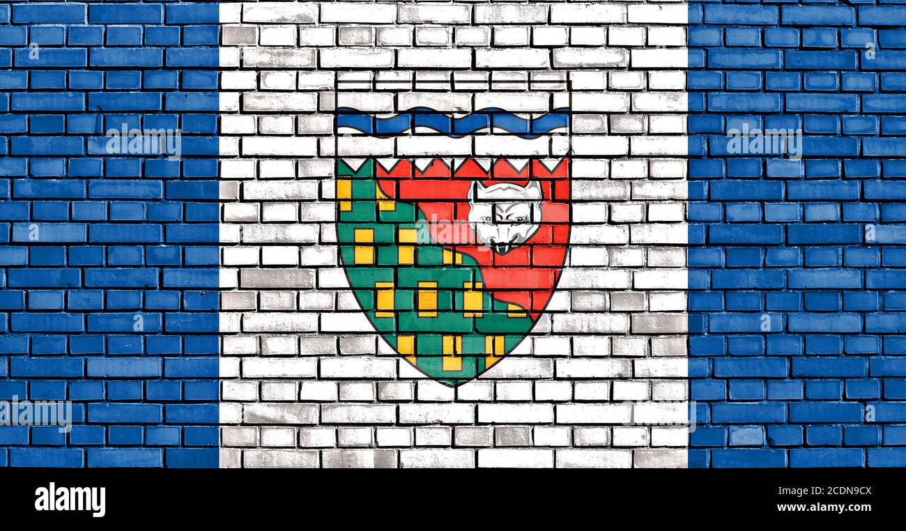 flag of Northwest Territories painted on brick wal Stock Photo