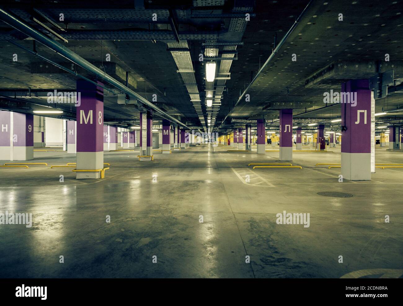 Parking Garage Underground Interior, Neon Lights In Dark Industrial  Building, Modern Public Construction Stock Photo, Picture and Royalty Free  Image. Image 21403100.