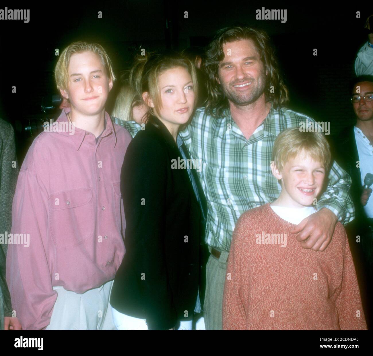Westwood, California, USA 11th March 1996 (L-R) Boston Russell, Actress Kate Hudson, actor Kurt Russell and son Wyatt Russell attend Warner Bros. Pictures' 'Executive Decision' Premiere on March 11, 1996 at Mann Village Theatre in Westwood, California, USA. Photo by Barry King/Alamy Stock Photo Stock Photo