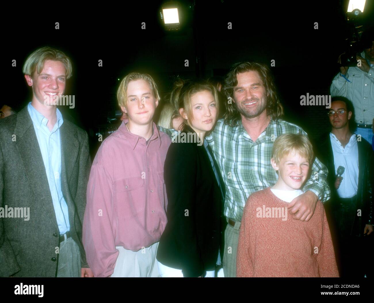 Westwood, California, USA 11th March 1996 (L-R) Guest, Boston Russell, Actress Kate Hudson, actor Kurt Russell and son Wyatt Russell attend Warner Bros. Pictures' 'Executive Decision' Premiere on March 11, 1996 at Mann Village Theatre in Westwood, California, USA. Photo by Barry King/Alamy Stock Photo Stock Photo