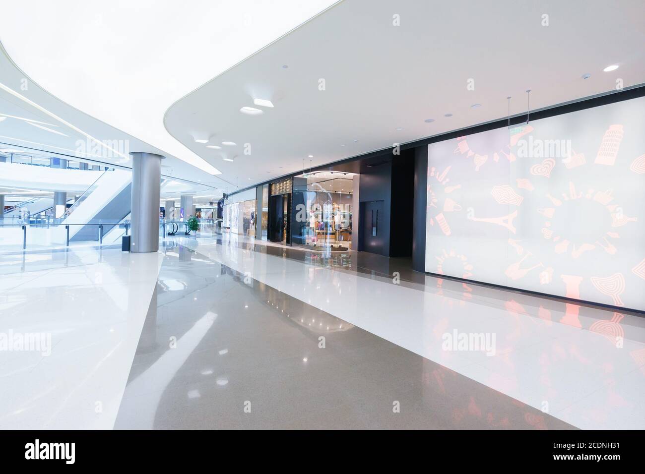 empty hallway with a huge billboard and abstract ceiling in modern