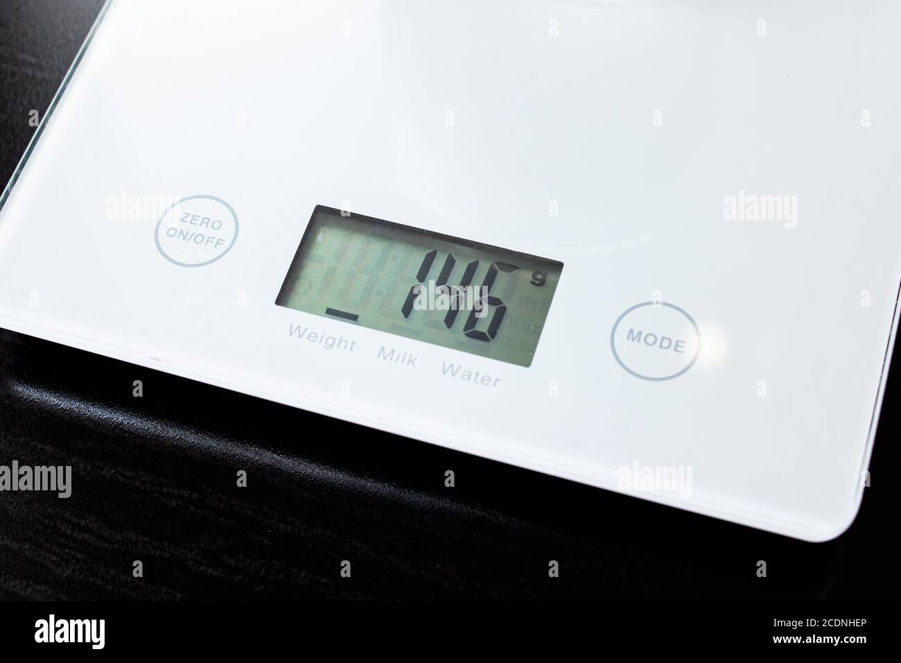 Indicator in grams on electronic scales closeup Stock Photo