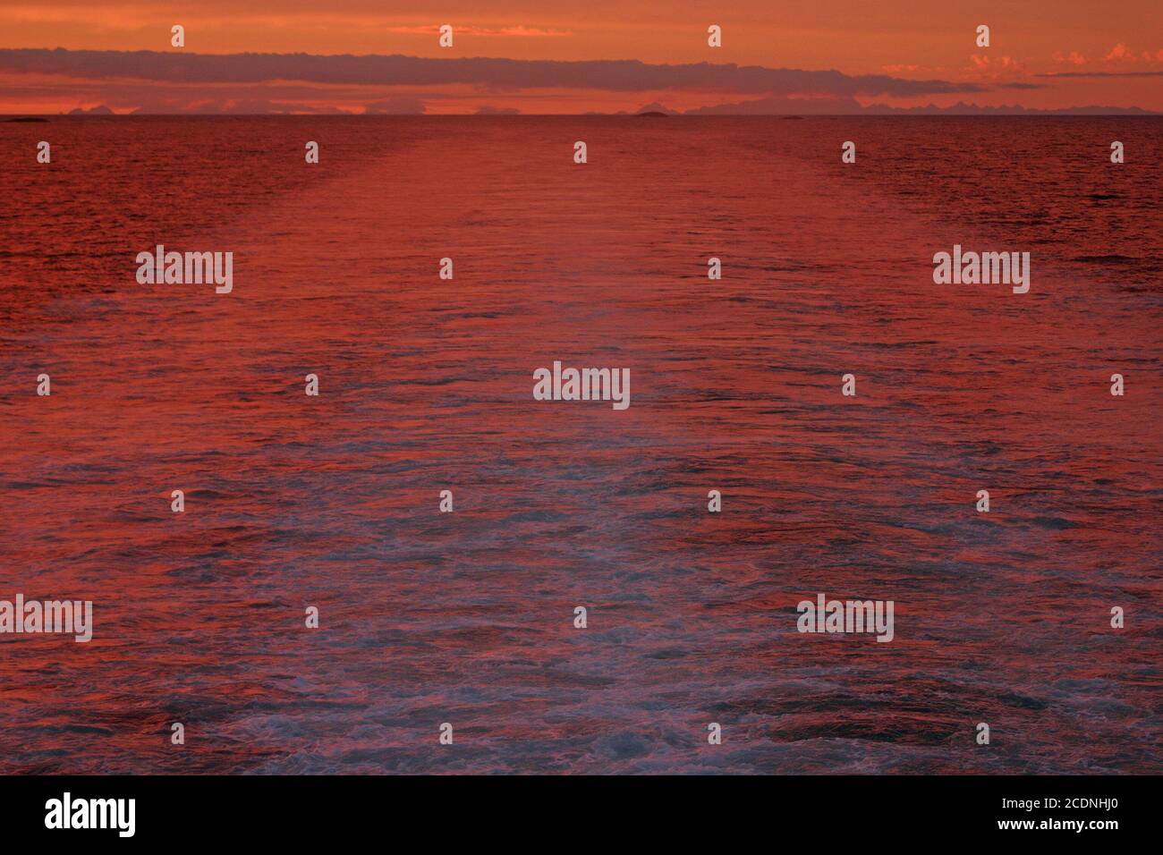 Boat wake and sunset Stock Photo