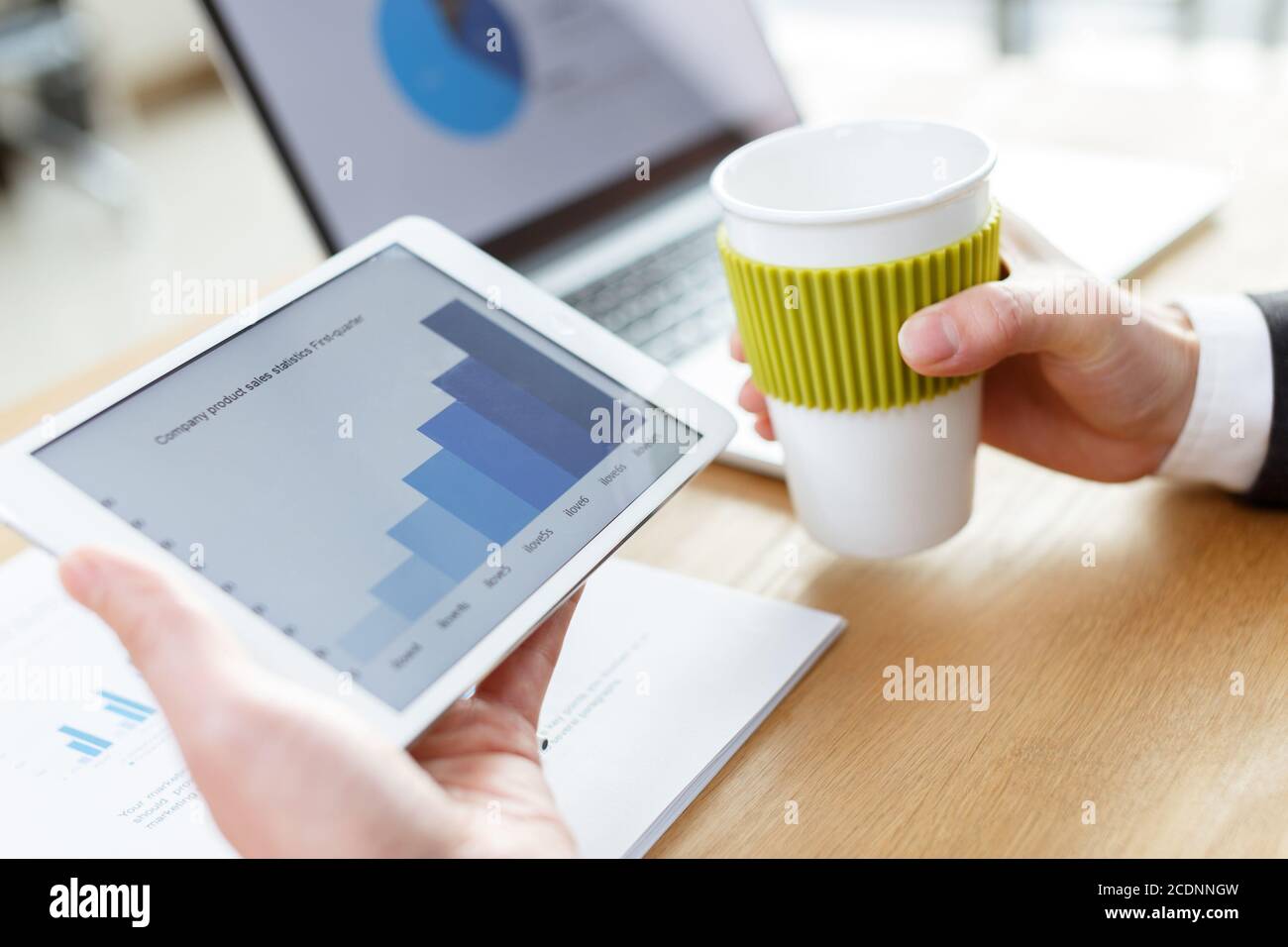 businessman checking financial reports on table Stock Photo