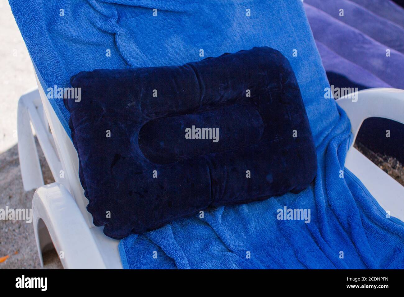sun lounger towel pillow on beach Stock Photo Alamy