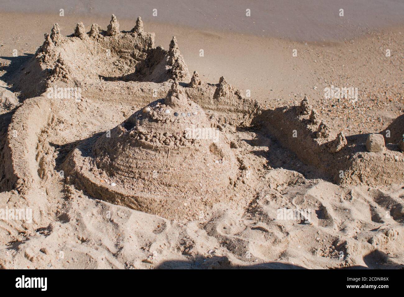 sand castle on the beach near sea Stock Photo Alamy