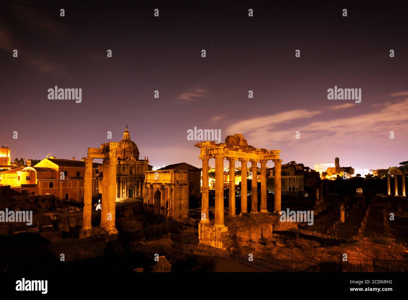 The Roman Forum, Italian Foro Romano in Rome, Italy at night. Stock Photo