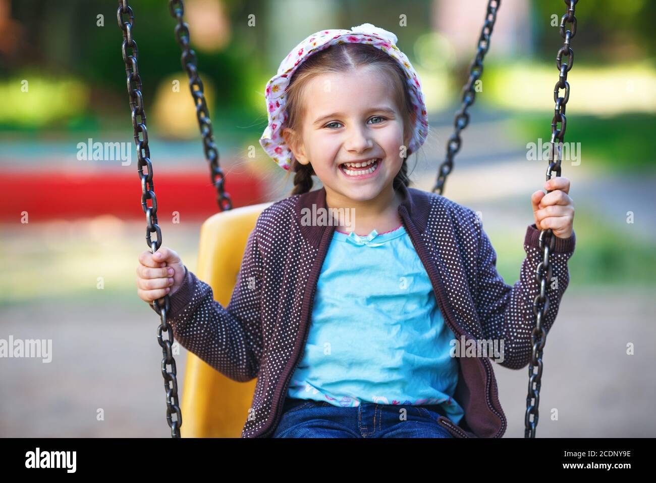 Child playing on playground hi-res stock photography and images - Alamy