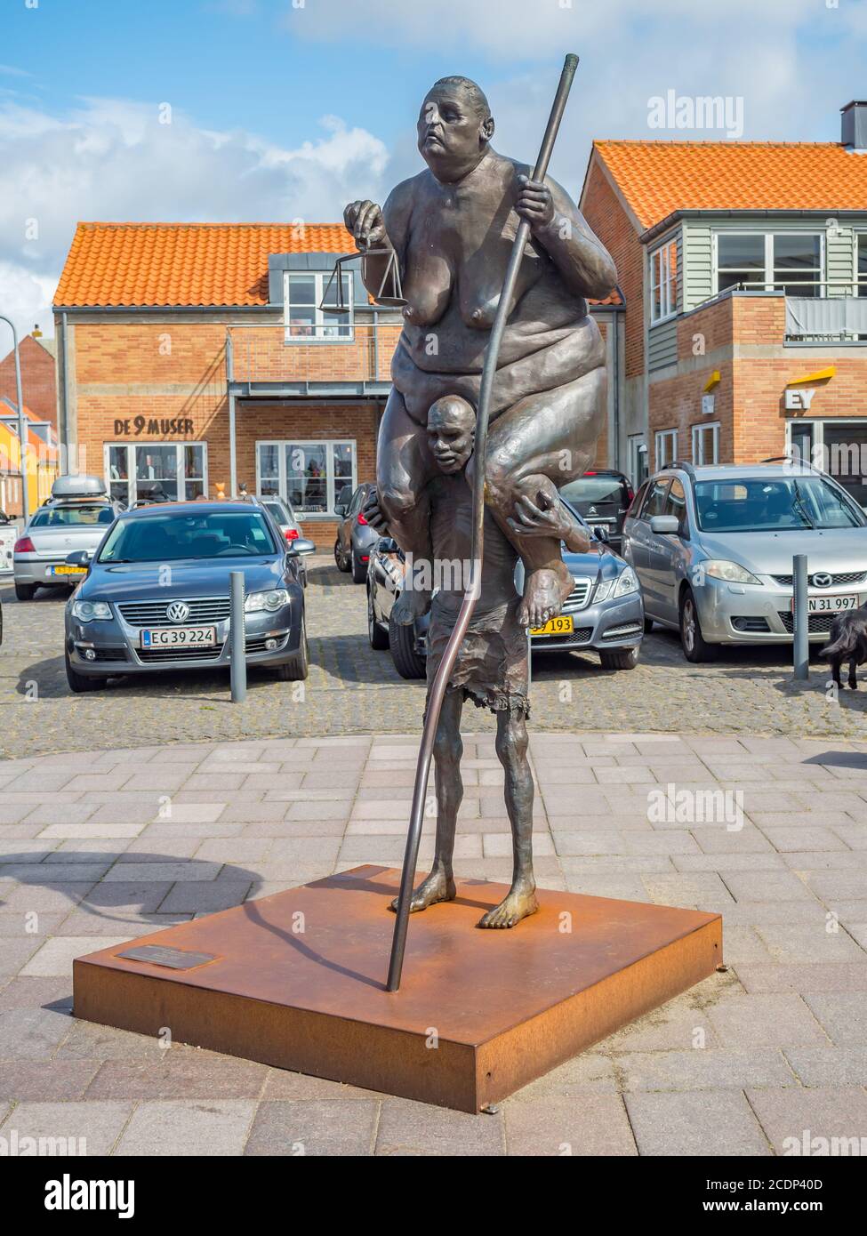 Famous Survival of the Fattest sculpture by Jens Galschiot symbol of the  imbalanced distribution of all the resources in Ringkobing on a sunny sum  Stock Photo - Alamy