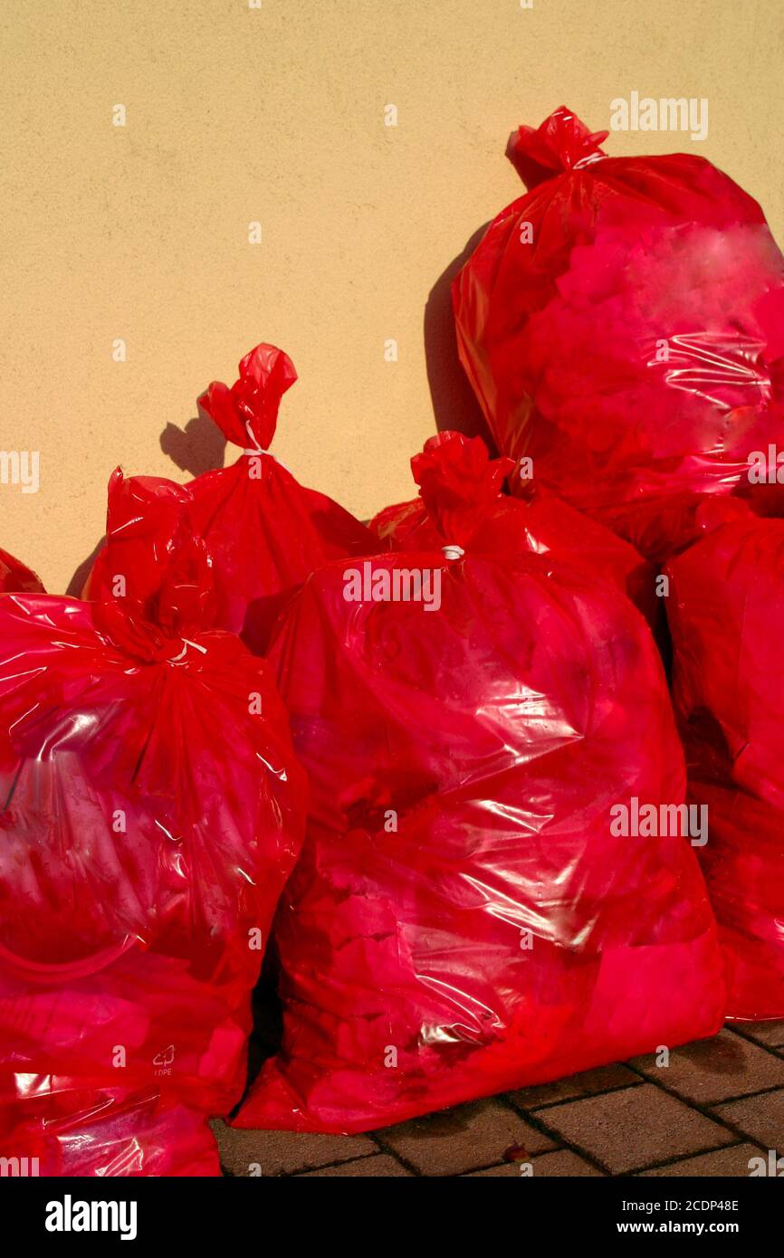 Red recycling bags hi-res stock photography and images - Alamy