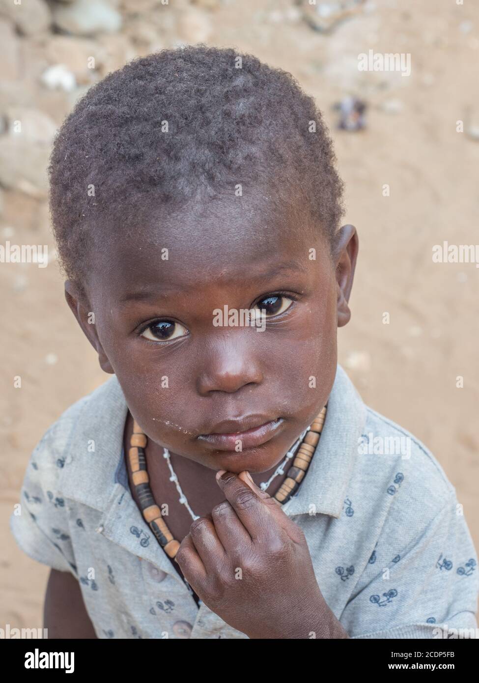 Senegal, Africa January 24, 2019 Portrait of a black boy with a big