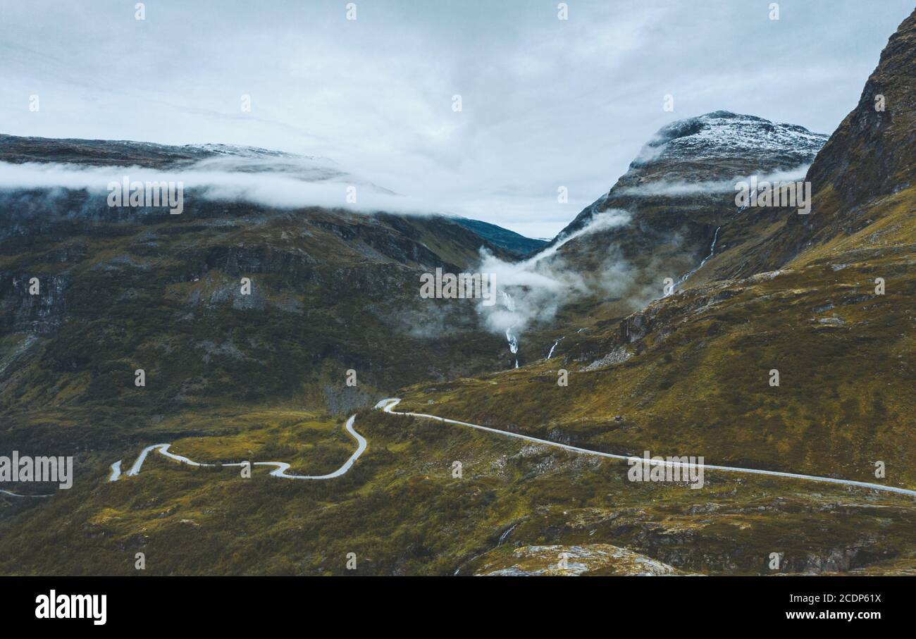 Aerial view Eagle road in foggy mountains landscape in Norway travel scandinavian nature drone scenery from above Stock Photo