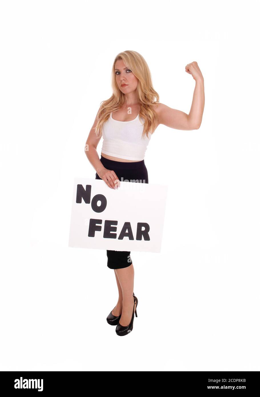 Blond woman holding sign NO FEAR. Stock Photo