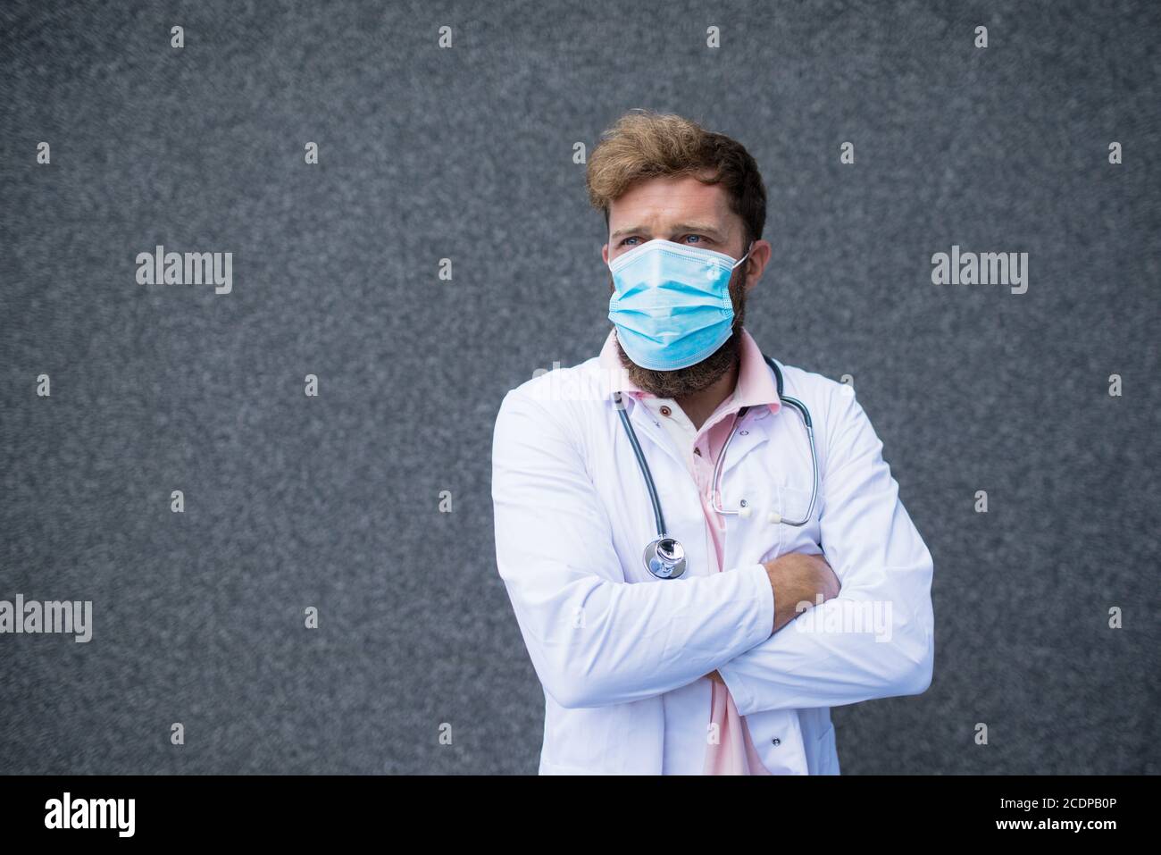 Doctor in white medical uniform hi-res stock photography and images - Alamy