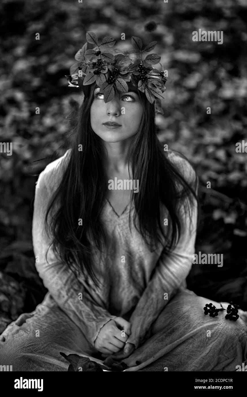 Young mystical woman in an wood elf like costume Stock Photo