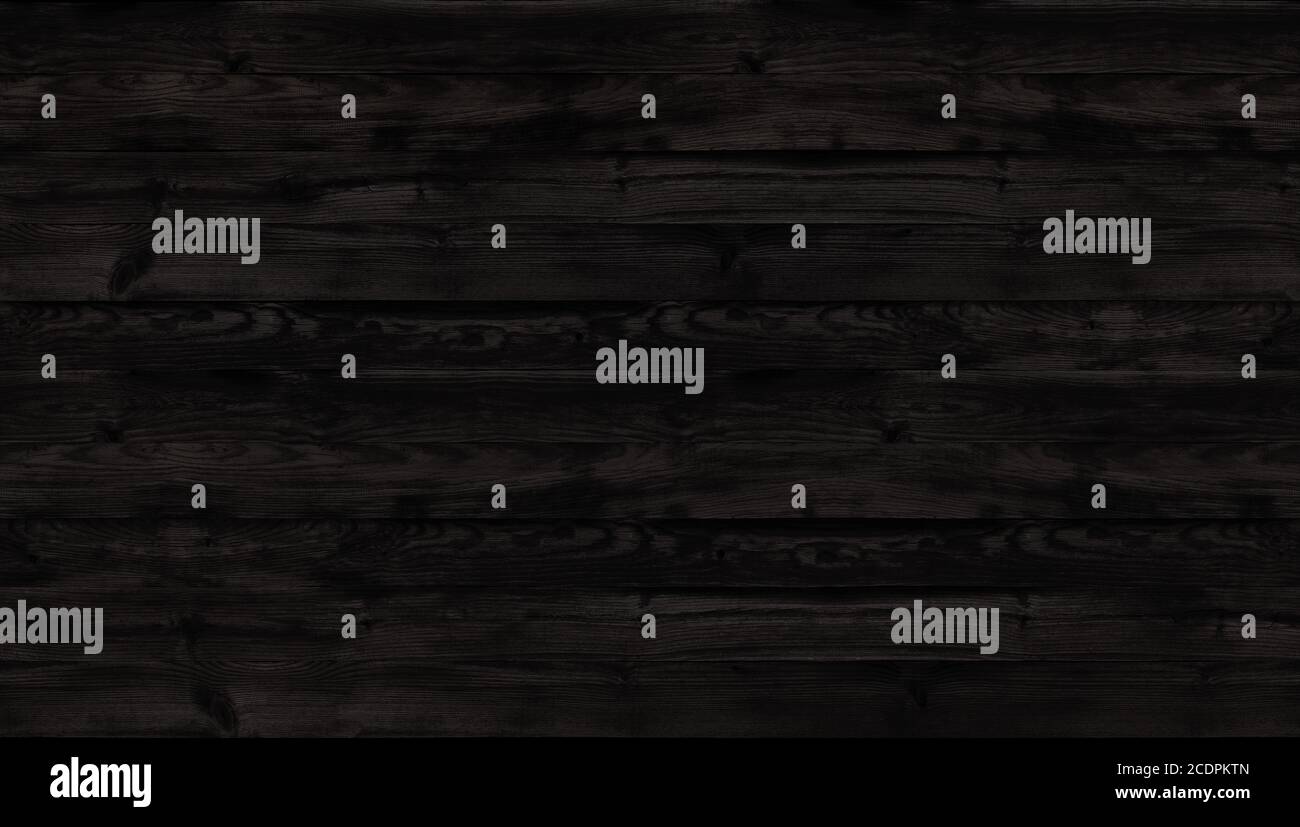 Dark wood texture, top view of wooden table. Dark wall background