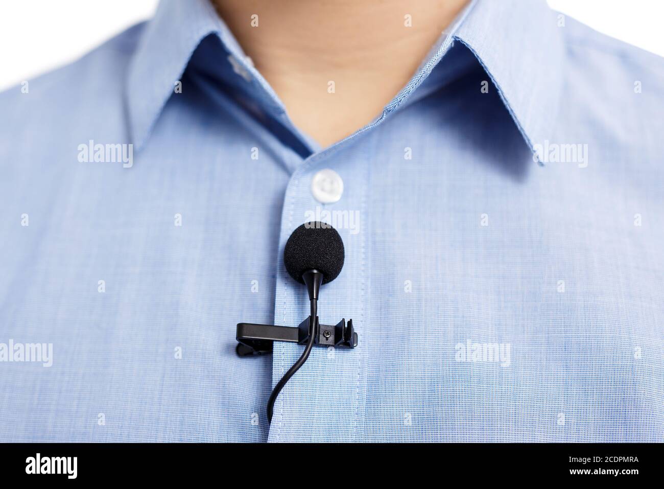 broadcasting and sound recording concept - close up of small lavalier clip-on  microphone on blue male shirt Stock Photo - Alamy