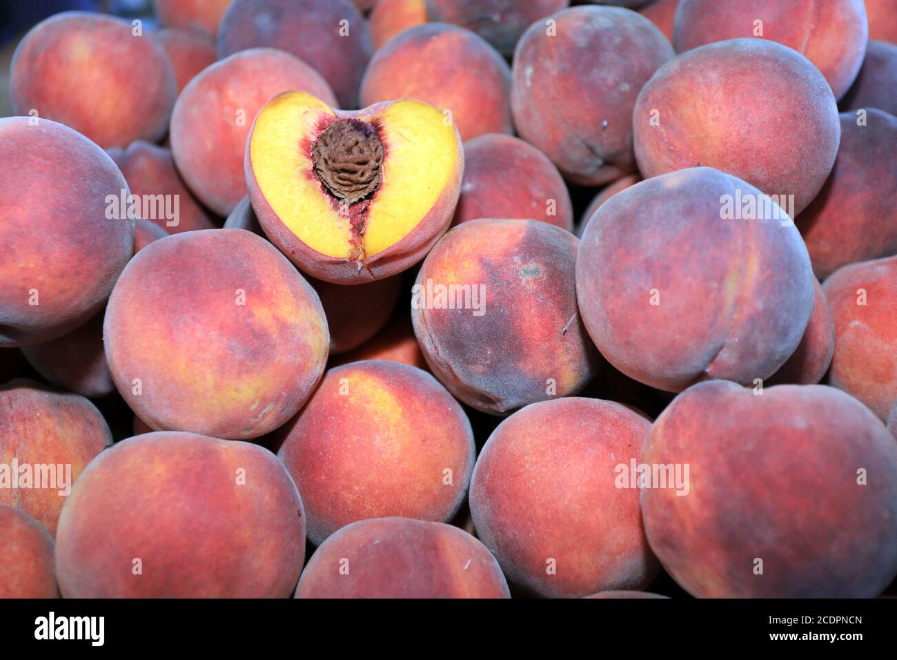 Peach Cut In Half High Resolution Stock Photography And Images Alamy
