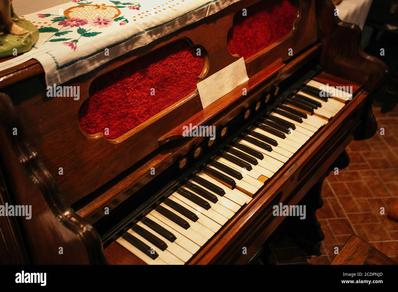 Old vintage harmonium piano keyboard. Close up view Stock Photo