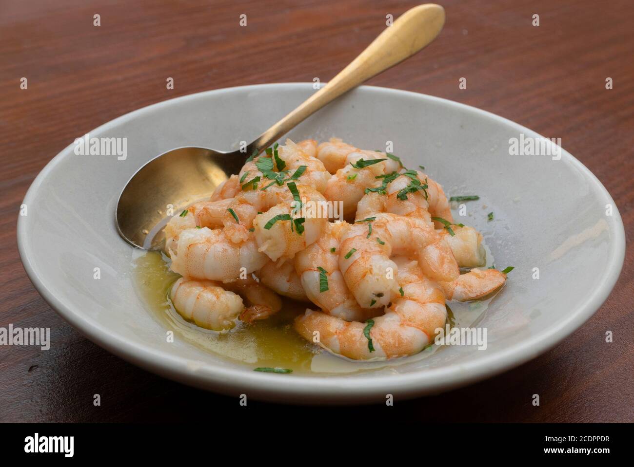 Shrimp with garlic and olive oil Stock Photo Alamy